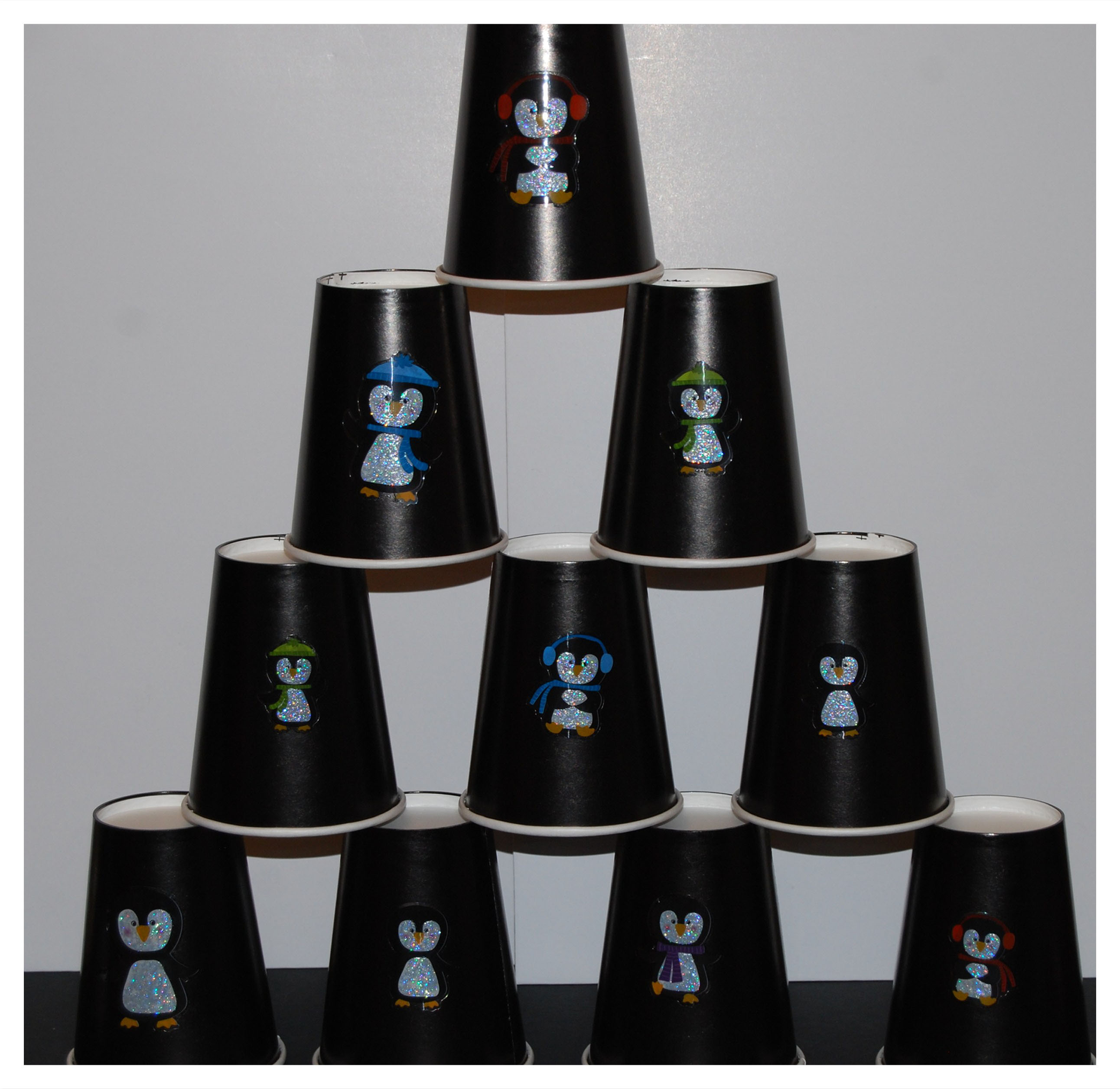 The Penguin and the Pinecone Stacking Cups • The Preschool Toolbox Blog